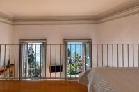Posteľ alebo postele v izbe v ubytovaní Villa Selva Luxury Lakeview Apartment