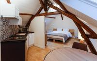 Łóżko lub łóżka w pokoju w obiekcie Brasserie de L ouest