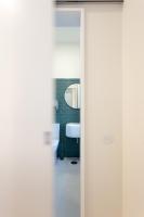 Postel nebo postele na pokoji v ubytování Vila Julieta Guesthouse