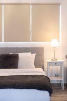 A bed or beds in a room at Mirabella spacious studio