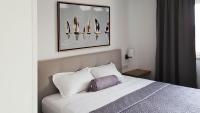 Posteľ alebo postele v izbe v ubytovaní Marisa Apartments Hvar II