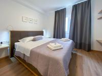 Posteľ alebo postele v izbe v ubytovaní Marisa Apartments Hvar II