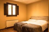 Postel nebo postele na pokoji v ubytování La Casa de la Quesería