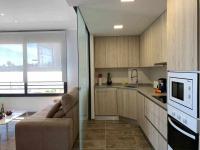 Kuchyňa alebo kuchynka v ubytovaní Apartamento de lujo en primera linea de playa