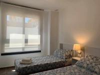 Posteľ alebo postele v izbe v ubytovaní Apartamento de lujo en primera linea de playa