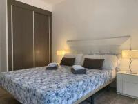 Posteľ alebo postele v izbe v ubytovaní Apartamento de lujo en primera linea de playa