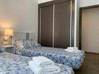 Posteľ alebo postele v izbe v ubytovaní Apartamento de lujo en primera linea de playa