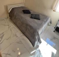 A bed or beds in a room at Ano Poli Studios 3