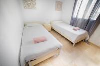 Postel nebo postele na pokoji v ubytování Villa el Roque