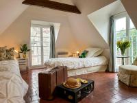 Posteľ alebo postele v izbe v ubytovaní L'Indépendance - Cottage - Château Le Bas Bleu