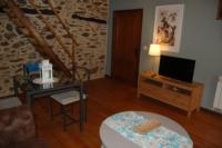 Televízia a/alebo spoločenská miestnosť v ubytovaní Apartamento Felicitas en La Casa de Cobos, Ribeira Sacra