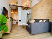 Posezení v ubytování B3 Verdeguer - Cozy Loft Close to the Beach