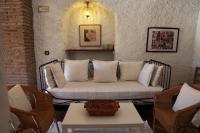 Posezení v ubytování Casas Cueva y Cortijo La Tala en Guadix