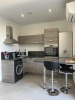 Kuchnia lub aneks kuchenny w obiekcie N1 Maison T2 climatisé