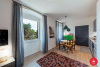 A television and/or entertainment centre at Wild Zagara Luxury Sea View