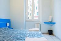 A bed or beds in a room at Banchi Centrale