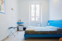 A bed or beds in a room at Banchi Centrale