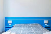 A bed or beds in a room at Banchi Centrale