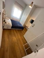 A bed or beds in a room at Harmony Luxury Grand Suite