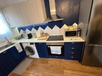 A kitchen or kitchenette at Harmony Luxury Grand Suite