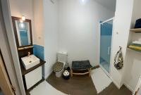a small bathroom with a sink and a shower at STUDIO de charme COSY BED, LA ROCHELLE in La Rochelle
