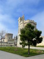 a castle with a tree in front of it at STUDIO de charme COSY BED, LA ROCHELLE in La Rochelle