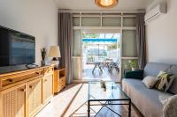 TV a/nebo společenská místnost v ubytování MalagaSuite Holidays Torremolinos