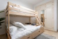 Postel nebo postele na pokoji v ubytování El Rey