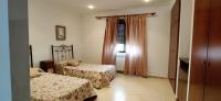 Postel nebo postele na pokoji v ubytování CASA RURAL ALHAMBRA RUIDERA