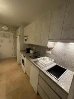 Kuchyňa alebo kuchynka v ubytovaní Apartamentos Esencia