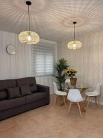 Posedenie v ubytovaní Apartamentos Esencia