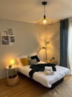 Posteľ alebo postele v izbe v ubytovaní Appartement - cœur de Ramonville
