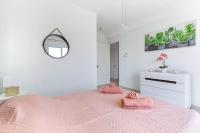 Postel nebo postele na pokoji v ubytování Penthouse Carina