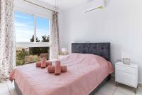 Postel nebo postele na pokoji v ubytování Penthouse Carina