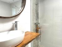 A bathroom at Cloud Tropical - Piscina climatizada - Gym Privado