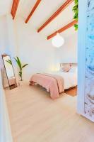 Postel nebo postele na pokoji v ubytování UNIQUE LOFT