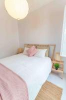 Postel nebo postele na pokoji v ubytování UNIQUE LOFT