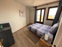 Łóżko lub łóżka w pokoju w obiekcie Appartement lumineux centre ville