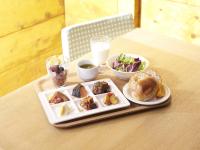 a tray of food on a table with a plate of food at APA Hotel Shinjuku Kabukicho Tower in Tokyo
