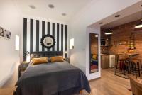 Posteľ alebo postele v izbe v ubytovaní 3on7 Apartments