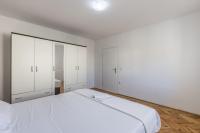 Posteľ alebo postele v izbe v ubytovaní Apartman Bella Vita