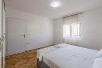 Posteľ alebo postele v izbe v ubytovaní Apartman Bella Vita