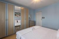 Posteľ alebo postele v izbe v ubytovaní Apartman Bella Vita