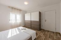 Posteľ alebo postele v izbe v ubytovaní Apartman Bella Vita