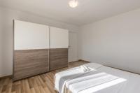 Posteľ alebo postele v izbe v ubytovaní Apartman Bella Vita