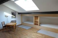 Posteľ alebo postele v izbe v ubytovaní Appartement dans vielle ferme au coeur des Vosges