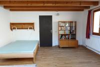 Posteľ alebo postele v izbe v ubytovaní Appartement dans vielle ferme au coeur des Vosges