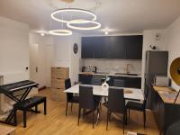 Kuchyňa alebo kuchynka v ubytovaní Appartement chic 5 min Disneyland/Vallée Village