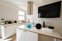 Kuchyňa alebo kuchynka v ubytovaní Appartement spacieux 70m2 avec 2 chambres - Terrasse expo sud - Coeur de Cannes