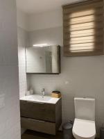 Um banheiro em Filoxenia Apartment